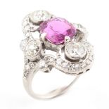 A fine white gold certificated unheated Ceylon pink sapphire & diamond ring, the cushion cut pink