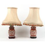 Property of a deceased estate - a pair of modern Chinese porcelain iron red decorated table lamps