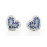 A pair of 18ct white gold sapphire & diamond heart shaped earrings, with clip fastenings, each
