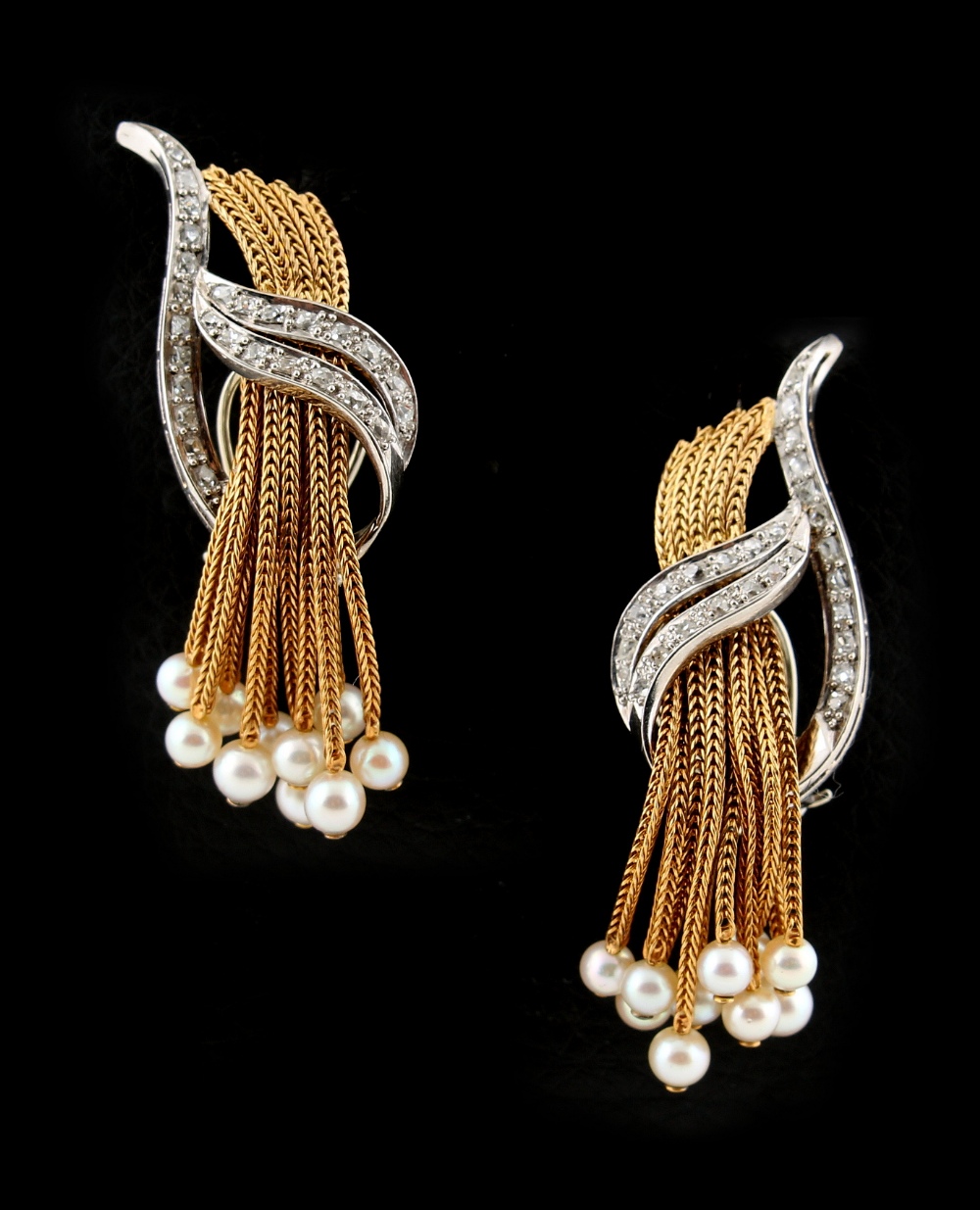 An attractive pair of yellow & white gold diamond & pearl tassel earrings, with post & clip