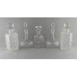 Property of a lady - two pairs of cut glass decanters with stoppers; together with another