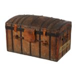 Property of a lady - a late 19th / early 20th century metalbound canvas domed trunk, with interior