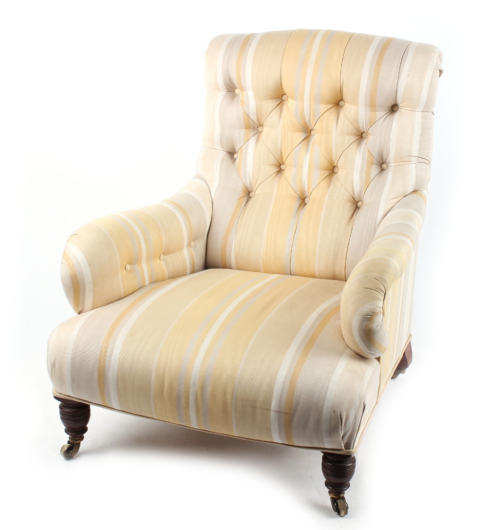 Property of a gentleman - a Victorian walnut & upholstered armchair, with turned front legs &