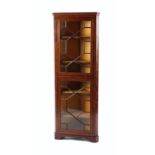 Property of a deceased estate - an early 20th century mahogany & feather-banded two-door