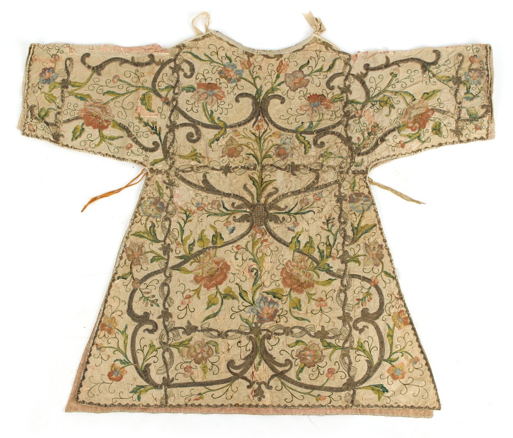 An embroidered silk jacket or tunic, probably English, 17th century, with gold & silver threads,
