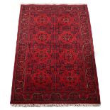 Property of a gentleman - a modern Turkoman design hand-knotted wool rug, with burgundy ground, 73