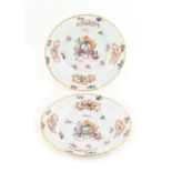 Property of a lady - a pair of 18th century Chinese Qianlong period armorial famille rose dishes,