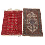 Property of a deceased estate - a small Turkoman rug with three rows of guls, 54 by 41ins. (137 by