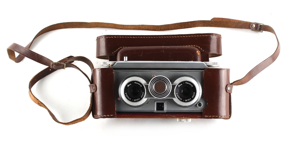 Property of a lady - an Iloca Stereo II camera, in tan leather case.