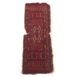 Property of a deceased estate - an antique Esari mat, 37 by 14ins. (94 by 35cms.).