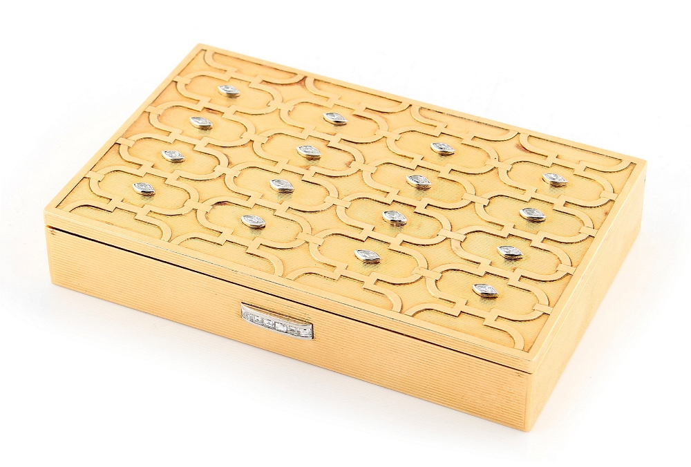 Cartier - an 18ct yellow gold minaudiere, the hinged cover set with sixteen marquise cut diamonds,