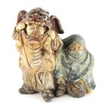 Property of a lady - a late 19th / early 20th century Japanese painted pottery lion dance group, 9.