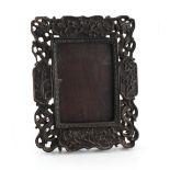 Property of a lady - a Chinese carved hardwood easel photograph frame, late 19th / early 20th