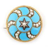 A large Victorian pale blue & black enamel circular brooch set with pearls, with central boss, the