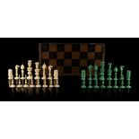 Property of a lady - a 19th century Chinese Canton green stained & natural ivory chess set,