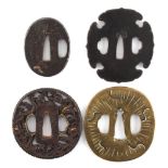 A collection of Japanese tsubas, 18th and 19th century, mixed metals - four assorted tsubas (4).