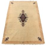 Property of a deceased estate - a small Persian Qum carpet, with floral medallion & spandrels on