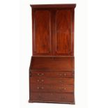 Property of a gentleman - a George III mahogany fall-front bureau with associated two-door cabinet