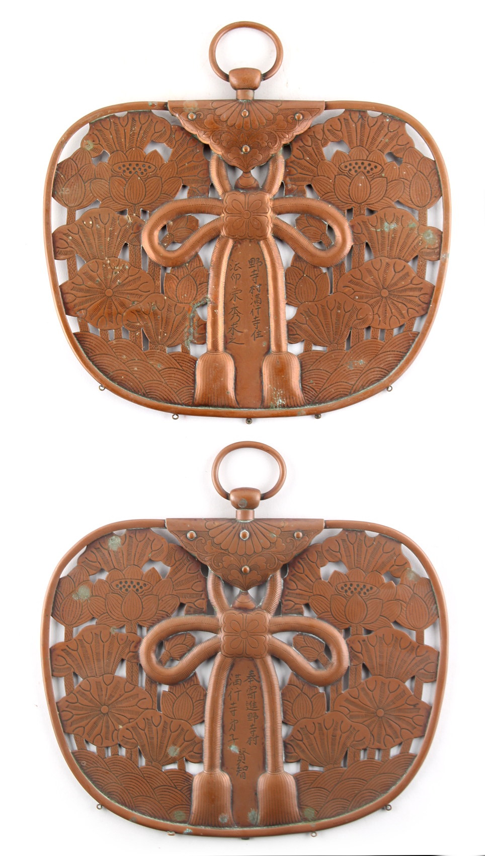 Property of a deceased estate - a pair of Japanese copper hanging panels, with pierced lotus