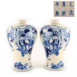 Property of a lady - a pair of late 19th century Chinese blue & white meiping vases, each painted