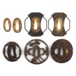 A collection of Japanese tsubas, 18th and 19th century, mixed metals - four assorted tsubas (4).