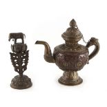 A Tibetan copper & brass ewer, late 19th / early 20th century, 8.4ins. (21.3cms.) high; together