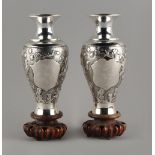 Property of a lady - a pair of Chinese silver baluster vases, late 19th / early 20th century, each