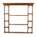 Property of a gentleman - a pine plate rack, 45.5ins. (115.5cms.) wide (overall).