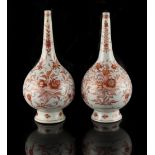 Property of a lady - a pair of Chinese iron red & gilt floral decorated rose water sprinklers,