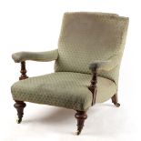 Property of a gentleman - a Victorian walnut & upholstered armchair, with turned front legs &