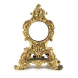 A 19th century French ormolu rococo clock case, 13ins. (33cms.) high.