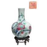 Property of a lady - a large Chinese famille rose peaches bottle vase, late 19th / early 20th