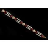 Van Cleef & Arpels - a fine 18ct yellow gold ruby, diamond & pearl bracelet by Van Cleef & Arpels,