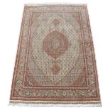 Property of a gentleman - a Persian Tabriz wool & silk small carpet, with ivory ground, 98 by 67ins.