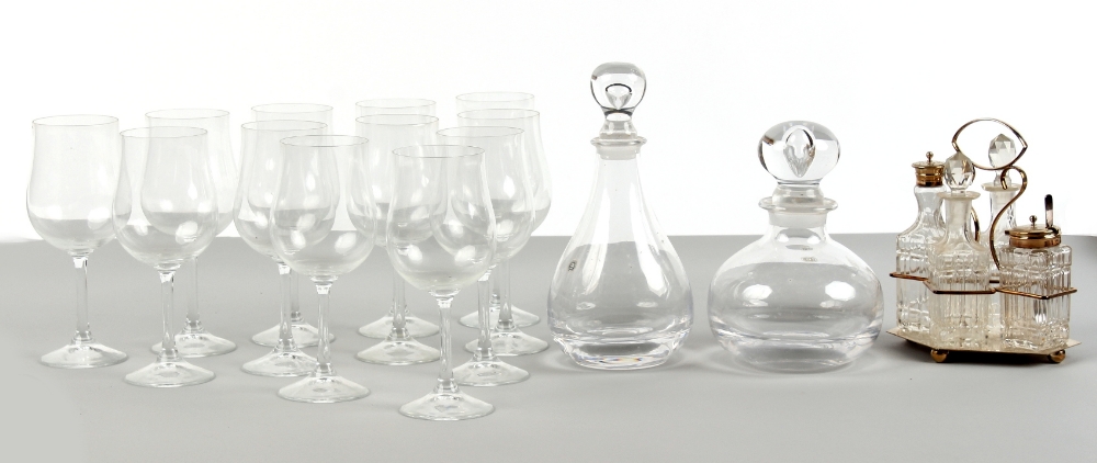 Property of a lady - two Dartington glass decanters; together with a set of twelve large wine