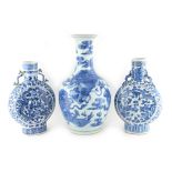 Property of a lady - a pair of Chinese blue & white moon flasks, each painted to either side with