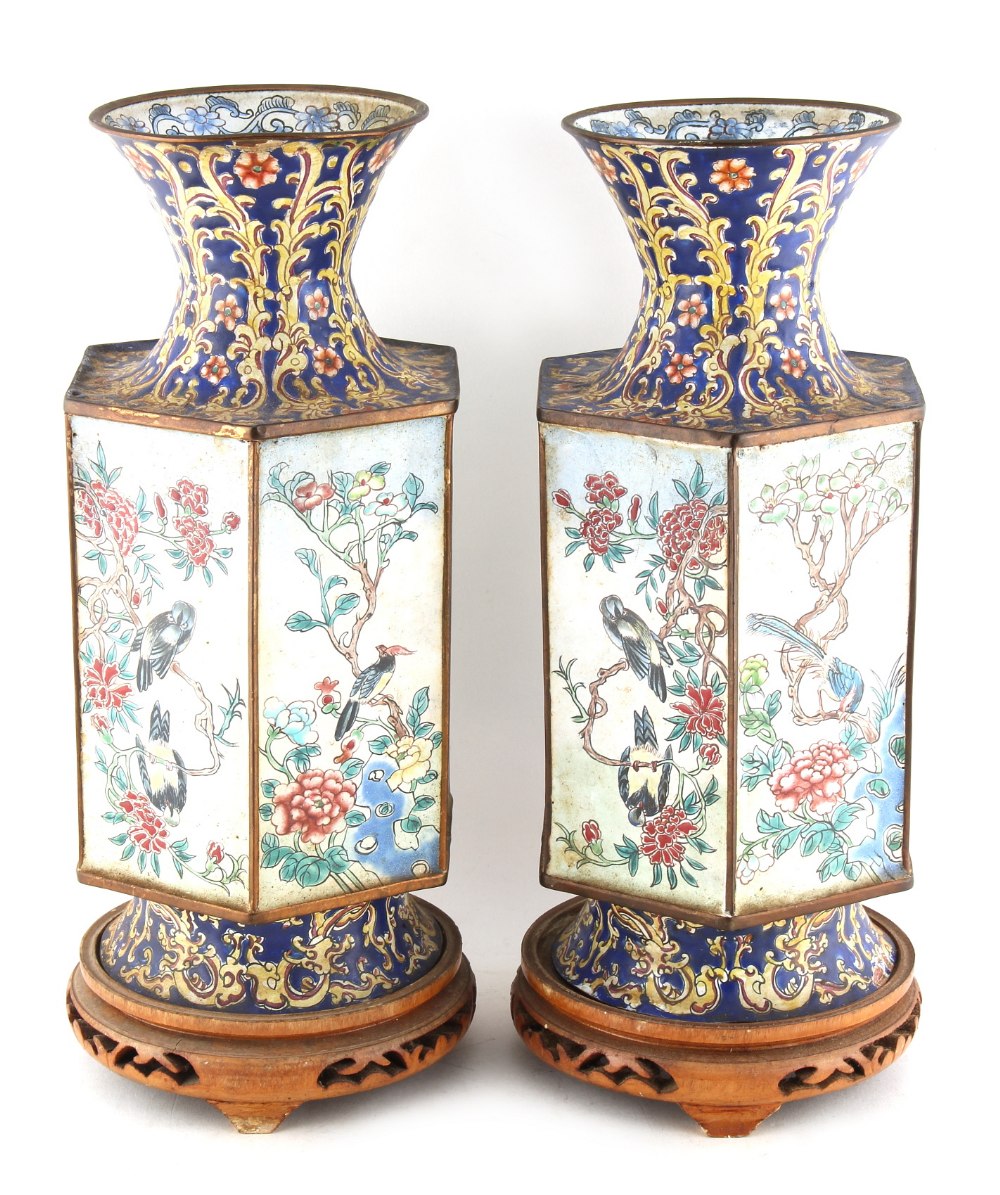 Property of a lady - a pair of early 20th century Chinese Canton enamel hexagonal vases, each