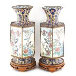 Property of a lady - a pair of early 20th century Chinese Canton enamel hexagonal vases, each