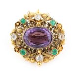 A Georgian cannetille amethyst & diamond brooch, the oval cut amethyst weighing approximately 7.18