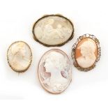 Property of a lady - an unmounted shell cameo, 45 by 33mm; together with three cameo brooches (4).