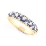 An 18ct yellow gold sapphire & diamond half hoop ring, the estimated total sapphire weight 0.60