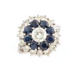 Property of a lady - an 18ct white gold sapphire & diamond cluster ring, the estimated total diamond