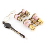 Property of a lady - two pairs of early 20th century pink enamel cased opera glasses; together