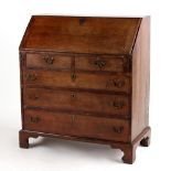 Property of a lady - a George III oak fall-front bureau, with two short & three long graduated