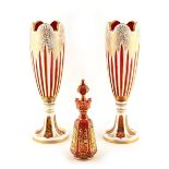 Property of a lady - a pair of 19th century Bohemian overlaid ruby glass vases, each 12.2ins. (