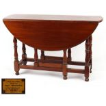 Property of a gentleman - a mahogany narrow gate-leg or wake table, with brass plaque inscribed '