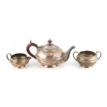 Property of a lady - an early 20th century silver three piece tea-set, S.W Smith & Co., Birmingham