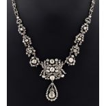 An impressive antique 19th century diamond necklace, the three largest diamonds each approximately
