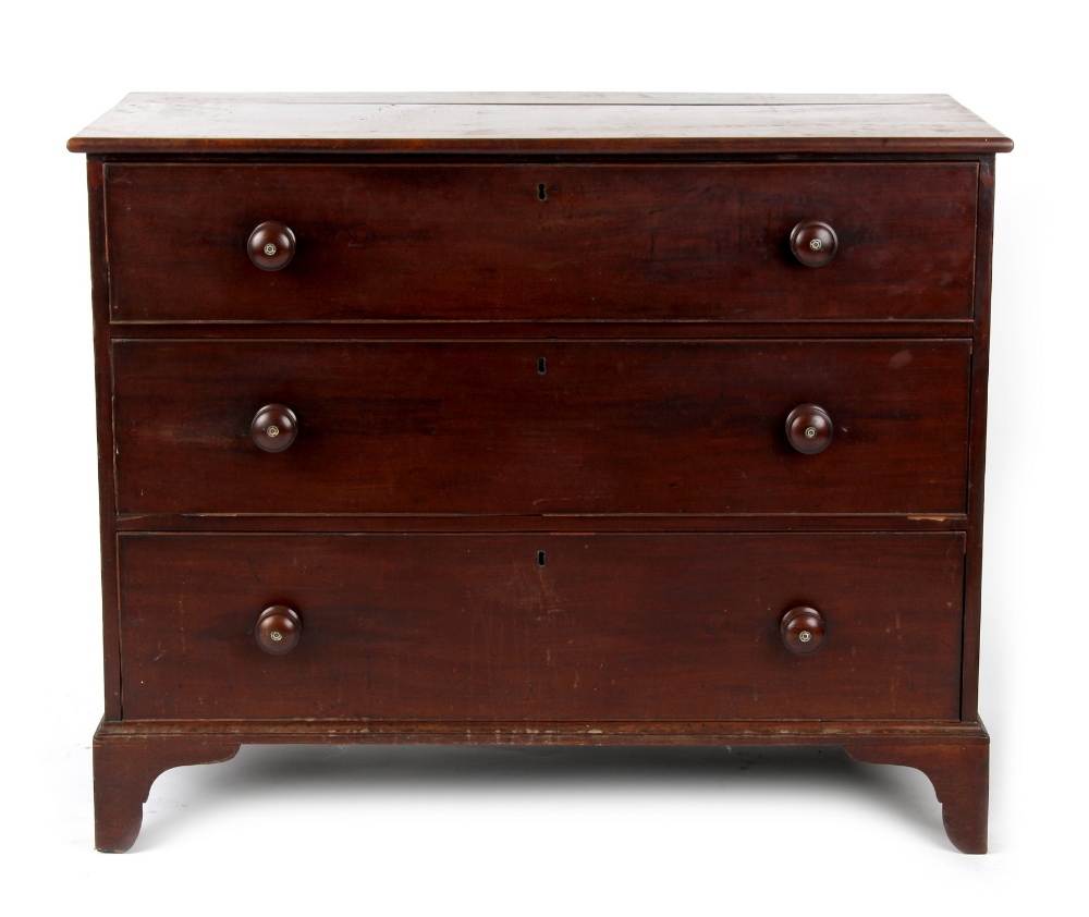 Property of a gentleman - a George IV mahogany chest of three long graduated drawers with turned