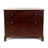 Property of a gentleman - a George IV mahogany chest of three long graduated drawers with turned